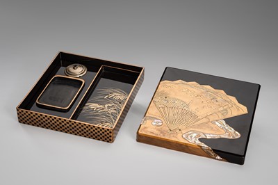 Lot 152 - OGATA KORIN: A RINPA-STYLE INLAID LACQUER SUZURIBAKO WITH FANS AND REEDS