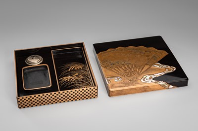 Lot 152 - OGATA KORIN: A RINPA-STYLE INLAID LACQUER SUZURIBAKO WITH FANS AND REEDS