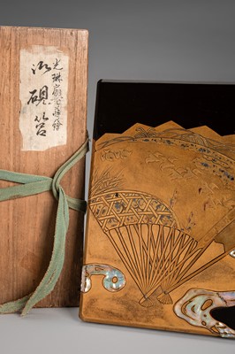 Lot 152 - OGATA KORIN: A RINPA-STYLE INLAID LACQUER SUZURIBAKO WITH FANS AND REEDS