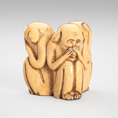 Lot 228 - A FUSHINA POTTERY OKIMONO OF THE SAMBIKI SARU (THREE WISE MONKEYS)