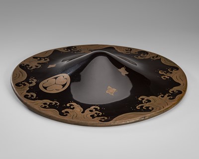 Lot 509 - A LACQUER JINGASA (WAR HAT) WITH WAVES AND CHIDORI