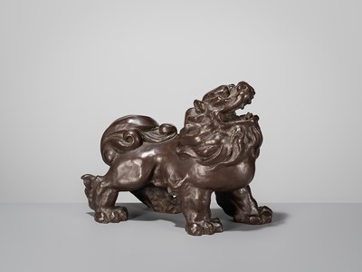 Lot 42 - SUKENOJO TERAHATA: A BRONZE OKIMONO OF A ROARING SHISHI