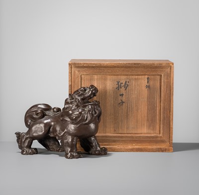 Lot 42 - SUKENOJO TERAHATA: A BRONZE OKIMONO OF A ROARING SHISHI