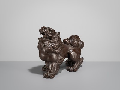 Lot 42 - SUKENOJO TERAHATA: A BRONZE OKIMONO OF A ROARING SHISHI
