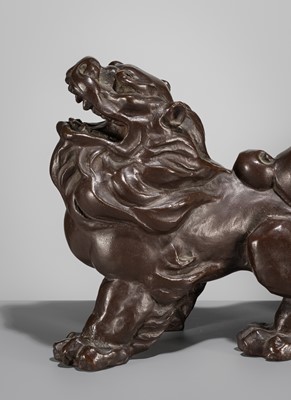 Lot 42 - SUKENOJO TERAHATA: A BRONZE OKIMONO OF A ROARING SHISHI