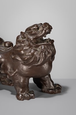 Lot 42 - SUKENOJO TERAHATA: A BRONZE OKIMONO OF A ROARING SHISHI