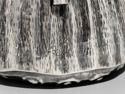 Lot 30 - JOMI EISUKE II: A RARE AND FINE SILVER LOTUS POD-FORM TEAPOT