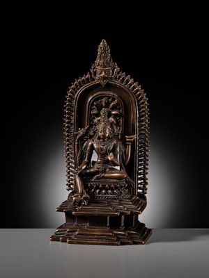 Lot 214 - AN IMPORTANT AND PUBLISHED COPPER ALLOY SHRINE OF SHIVA, ORISSA, 11TH CENTURY
