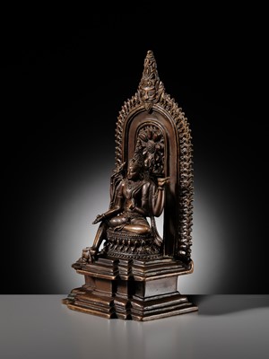 Lot 214 - AN IMPORTANT AND PUBLISHED COPPER ALLOY SHRINE OF SHIVA, ORISSA, 11TH CENTURY