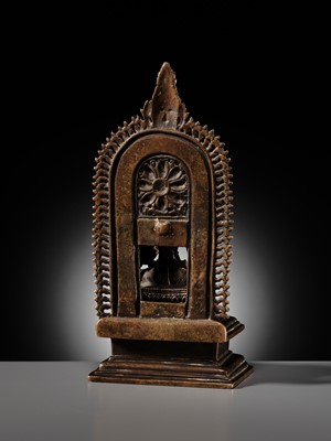 Lot 214 - AN IMPORTANT AND PUBLISHED COPPER ALLOY SHRINE OF SHIVA, ORISSA, 11TH CENTURY