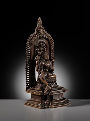 Lot 214 - AN IMPORTANT AND PUBLISHED COPPER ALLOY SHRINE OF SHIVA, ORISSA, 11TH CENTURY