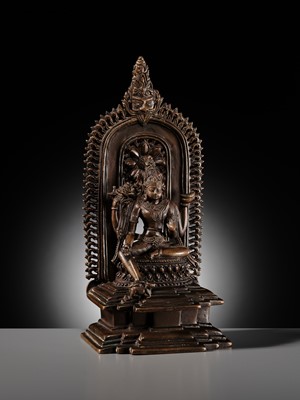 Lot 214 - AN IMPORTANT AND PUBLISHED COPPER ALLOY SHRINE OF SHIVA, ORISSA, 11TH CENTURY