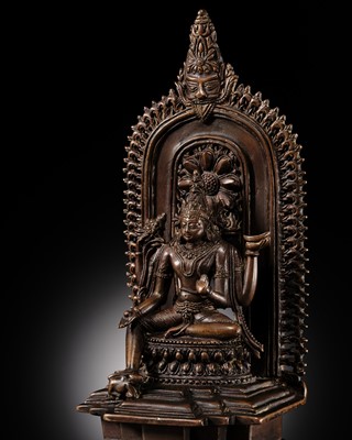 Lot 214 - AN IMPORTANT AND PUBLISHED COPPER ALLOY SHRINE OF SHIVA, ORISSA, 11TH CENTURY