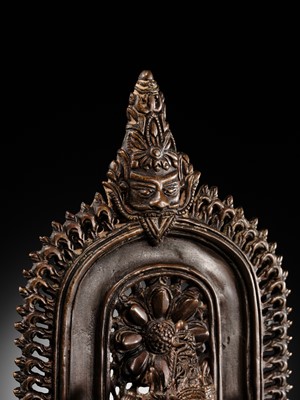 Lot 214 - AN IMPORTANT AND PUBLISHED COPPER ALLOY SHRINE OF SHIVA, ORISSA, 11TH CENTURY