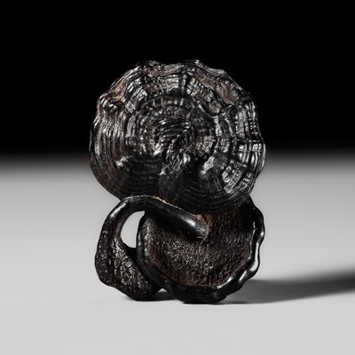 Lot 285 - KIRAKU: A LARGE EBONY WOOD NETSUKE OF TWO REISHI FUNGI