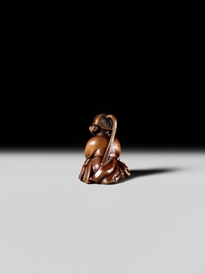 Lot 128 - SHUOSAI HIDEMASA: A FINE WOOD NETSUKE OF OKAME