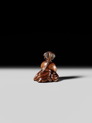 Lot 128 - SHUOSAI HIDEMASA: A FINE WOOD NETSUKE OF OKAME