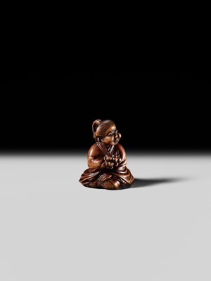 Lot 128 - SHUOSAI HIDEMASA: A FINE WOOD NETSUKE OF OKAME