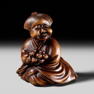 Lot 128 - SHUOSAI HIDEMASA: A FINE WOOD NETSUKE OF OKAME