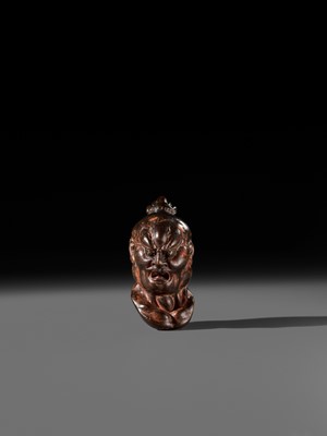Lot 297 - A LARGE AND SUPERB LACQUERED AND CARVED HINOKI WOOD NETSUKE OF A NIO HEAD, ATTRIBUTED TO NAITO KOSEKI