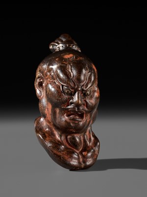 Lot 297 - A LARGE AND SUPERB LACQUERED AND CARVED HINOKI WOOD NETSUKE OF A NIO HEAD, ATTRIBUTED TO NAITO KOSEKI