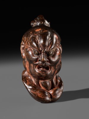 Lot 297 - A LARGE AND SUPERB LACQUERED AND CARVED HINOKI WOOD NETSUKE OF A NIO HEAD, ATTRIBUTED TO NAITO KOSEKI