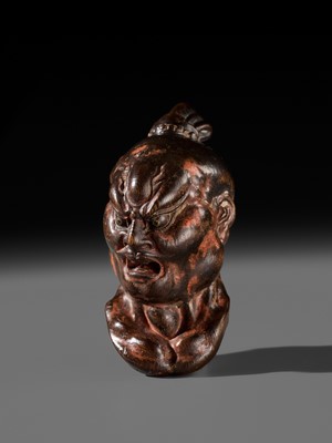 Lot 297 - A LARGE AND SUPERB LACQUERED AND CARVED HINOKI WOOD NETSUKE OF A NIO HEAD, ATTRIBUTED TO NAITO KOSEKI