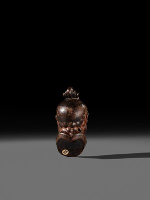 Lot 297 - A LARGE AND SUPERB LACQUERED AND CARVED HINOKI WOOD NETSUKE OF A NIO HEAD, ATTRIBUTED TO NAITO KOSEKI