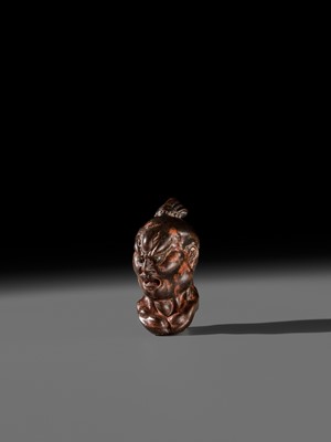 Lot 297 - A LARGE AND SUPERB LACQUERED AND CARVED HINOKI WOOD NETSUKE OF A NIO HEAD, ATTRIBUTED TO NAITO KOSEKI