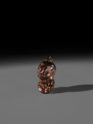 Lot 297 - A LARGE AND SUPERB LACQUERED AND CARVED HINOKI WOOD NETSUKE OF A NIO HEAD, ATTRIBUTED TO NAITO KOSEKI