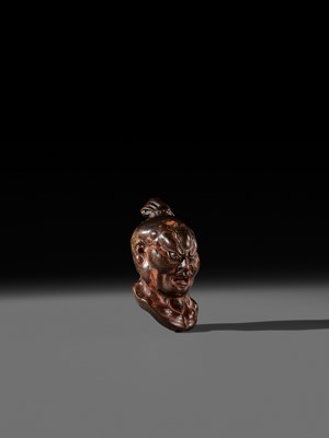 Lot 297 - A LARGE AND SUPERB LACQUERED AND CARVED HINOKI WOOD NETSUKE OF A NIO HEAD, ATTRIBUTED TO NAITO KOSEKI
