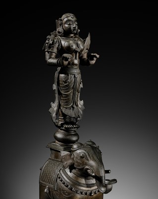 Lot 221 - A LARGE AND MASSIVE BRONZE FIGURE OF LAKSHMI ON AN ELEPHANT, DECCAN, 17TH-18TH CENTURY