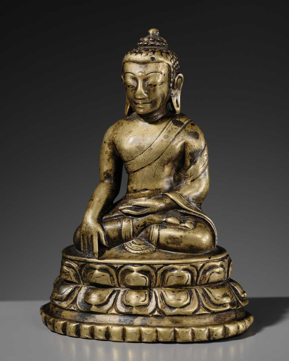 Lot 9 - A COPPER-ALLOY FIGURE OF BUDDHA SHAKYAMUNI, TIBET, 12TH-13TH CENTURY