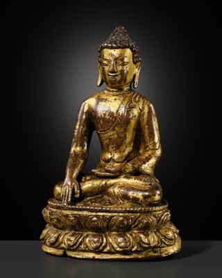 Lot 300 - A GILT COPPER ALLOY FIGURE OF BUDDHA, TIBET, 14TH CENTURY