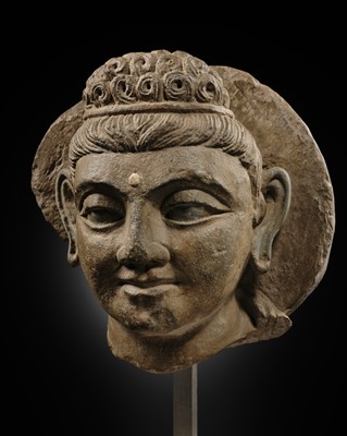 Lot 571 - A SCHIST HEAD OF BUDDHA, ANCIENT REGION OF GANDHARA, 3RD-4TH CENTURY