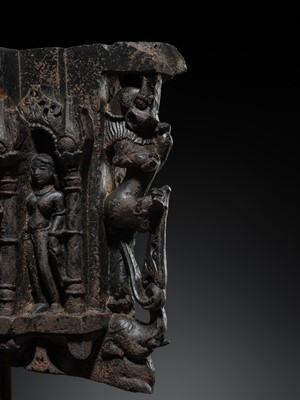 Lot 615 - A BLACK STONE ARCH SHRINE OF VISHNU AND CONSORTS, RAJASTHAN, 12TH-13TH CENTURY
