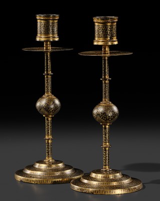 Lot 608 - A PAIR OF BRASS-INLAID BIDRI WARE CANDLE STICKS