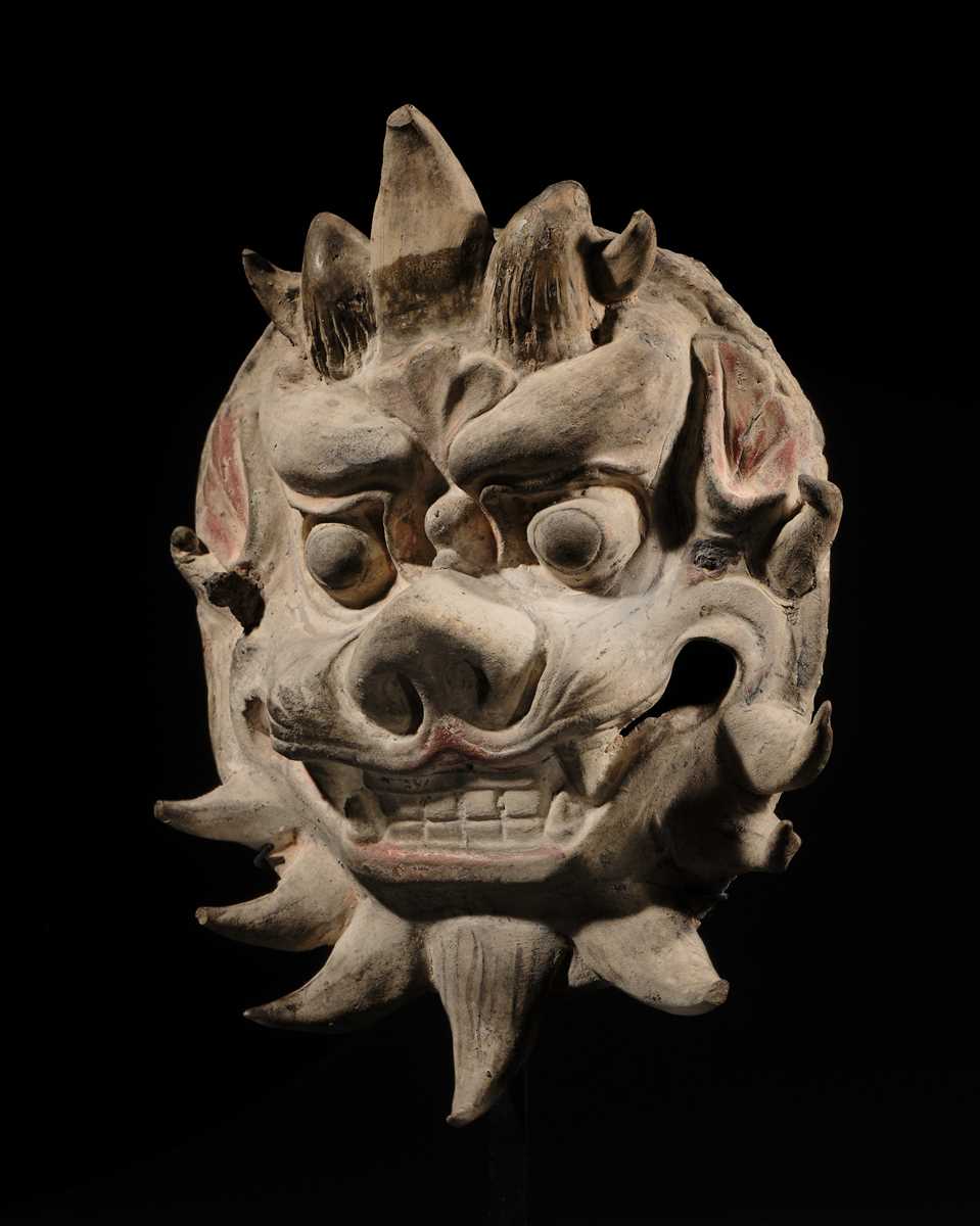 Lot 109 - A RARE POTTERY HORNED 'MONSTER' MASK, PUSHOU, TANG DYNASTY