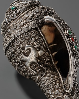 Lot 3 - A SILVER, CORAL AND TURQUOISE CEREMONIAL CONCH SHELL TRUMPET, DUNG-DKAR, 19TH CENTURY