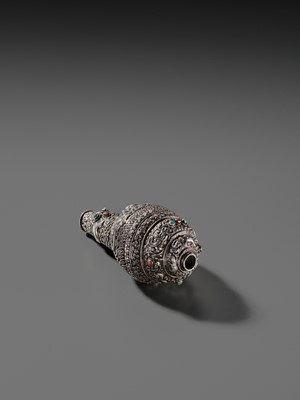 Lot 3 - A SILVER, CORAL AND TURQUOISE CEREMONIAL CONCH SHELL TRUMPET, DUNG-DKAR, 19TH CENTURY