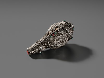 Lot 3 - A SILVER, CORAL AND TURQUOISE CEREMONIAL CONCH SHELL TRUMPET, DUNG-DKAR, 19TH CENTURY