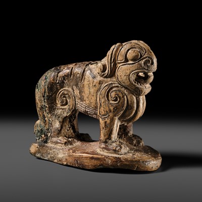 Lot 110 - A RARE ARCHAIC BONE FIGURE OF A TIGER, WESTERN ZHOU DYNASTY