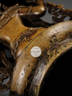 Lot 19 - A COPPER ALLOY FIGURE OF SHADAKSHARI LOKESHVARA, TIBETAN-CHINESE, 15TH CENTURY