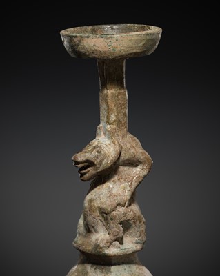 Lot 495 - A GREEN-GLAZED POTTERY 'BEAR' LAMPSTAND, HAN DYNASTY