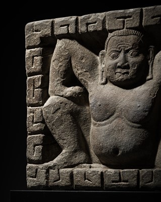 Lot 296 - AN UNUSUAL SANDSTONE RELIEF OF A CROUCHING GANA, LICCHAVI PERIOD