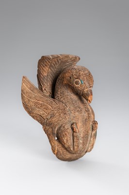 Lot 1251 - AN INDIAN WOOD RELIEF CARVING OF A DOVE, 17TH CENTURY