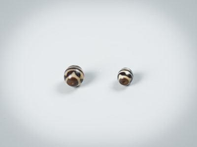 Lot 50 - TWO AGATE CHUNG DZI BEADS