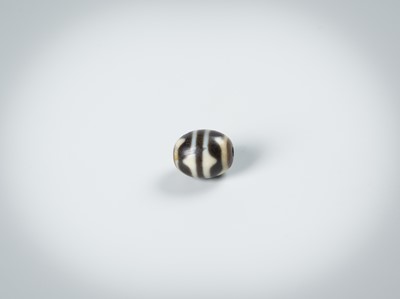 Lot 50 - TWO AGATE CHUNG DZI BEADS
