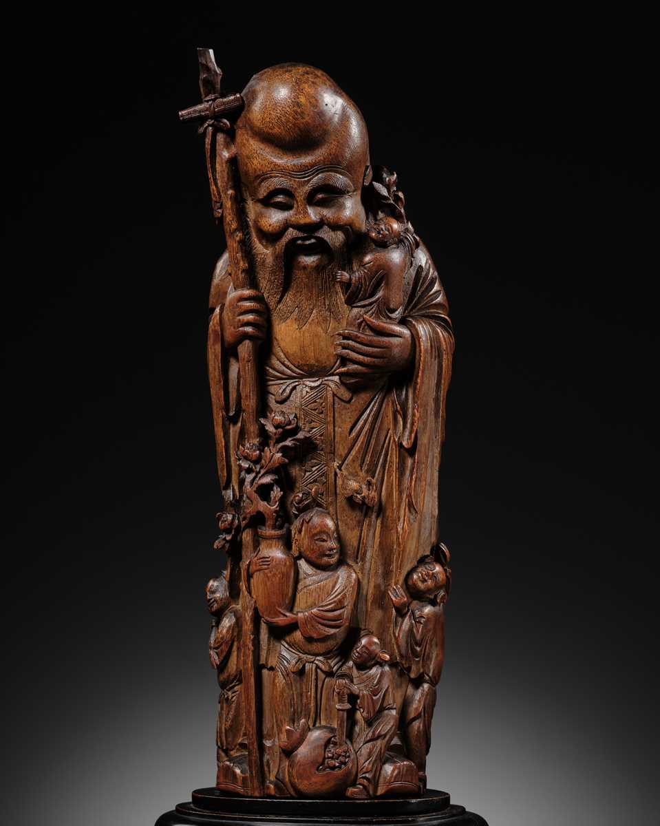 A LARGE BAMBOO FIGURE OF SHOULAO, QING DYNASTY