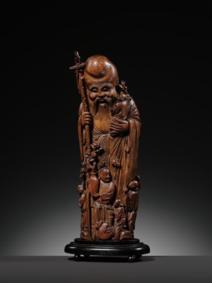 A LARGE BAMBOO FIGURE OF SHOULAO, QING DYNASTY